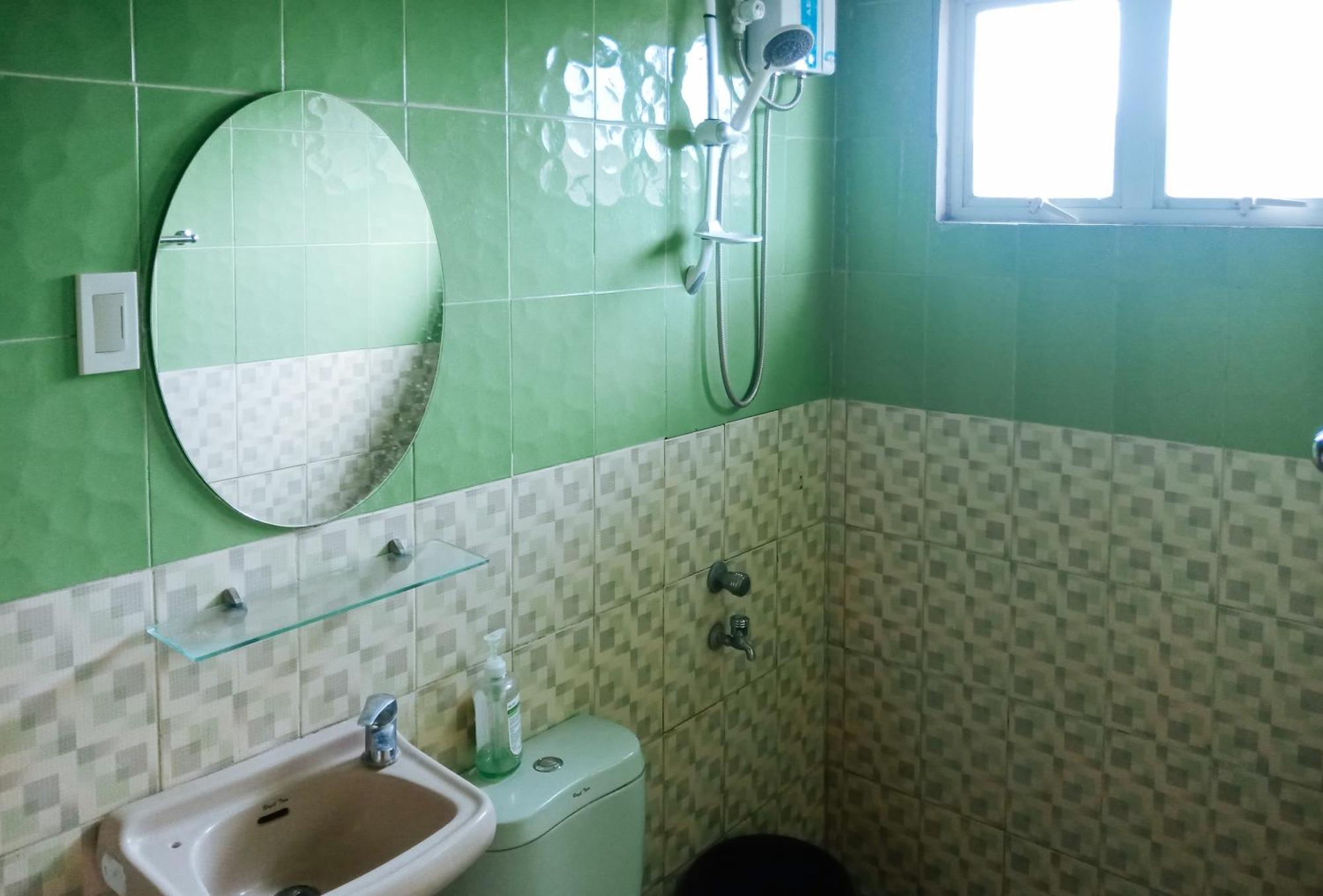 Villa Asuncion Country Inn And Resort Iloilo By Reddoorz Tigbauan Habitación foto
